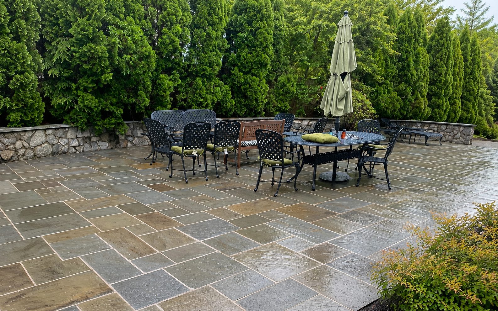 Clean residential patio with tables and chairs